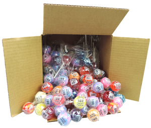 Image of a variety of lollipops pouring out a box.