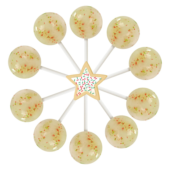 10 sugar cookie lollipops arranged in a circle with a cartoon sugar cookie in the center.