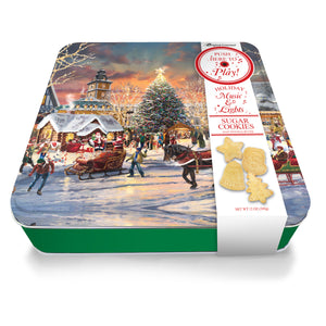 Music & Lights Thomas  Kinkade Christmas Festival Tin w/ 12oz of Sugar Cookies.