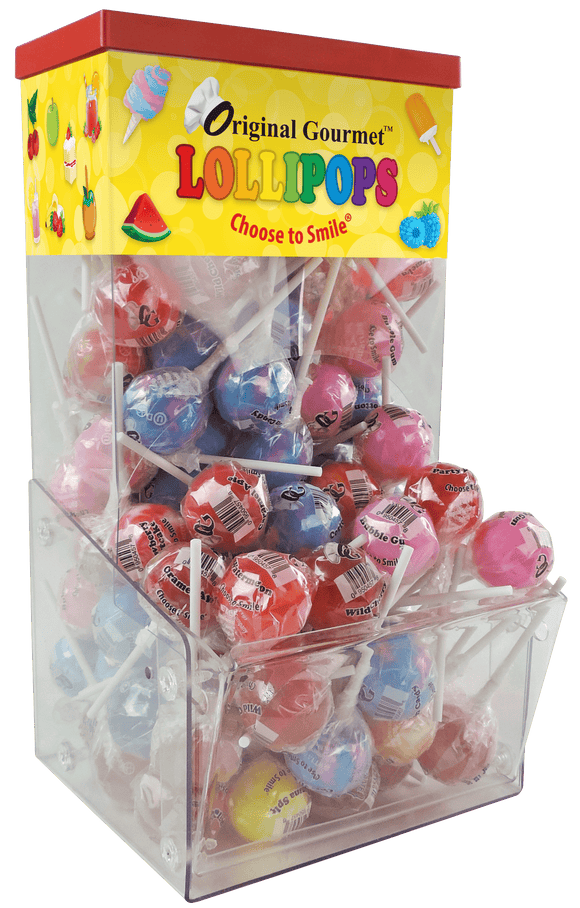 Tall clear plastic display box full of lollipops gravity fed to an open area where you can grab the lollipops. The top front of the display reads Original gourmet lollipops choose to smile. 